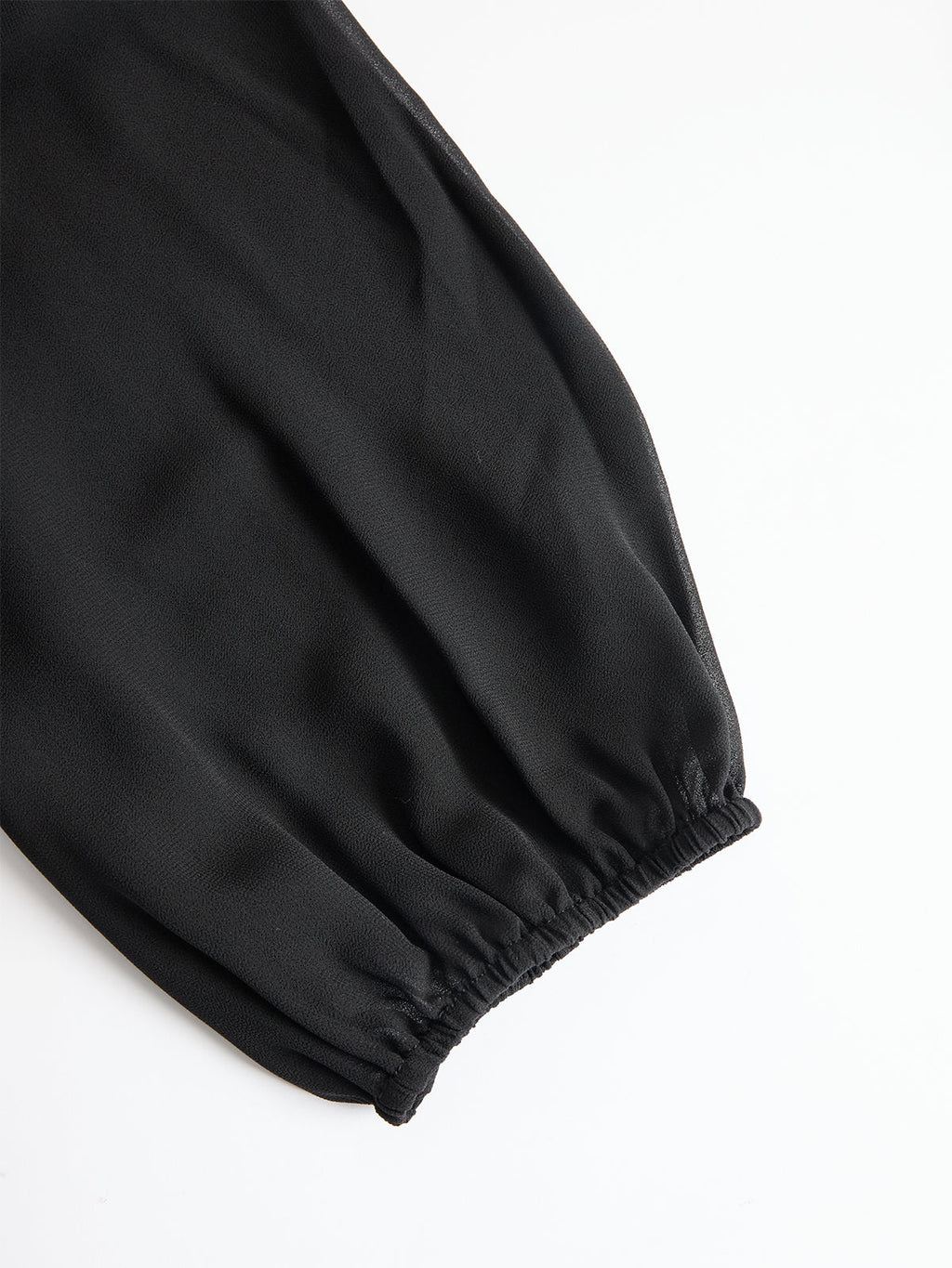 PARIS | Conjunto Negro Elegante con Mangas Abullonadas y Diseño de Pierna Ancha.