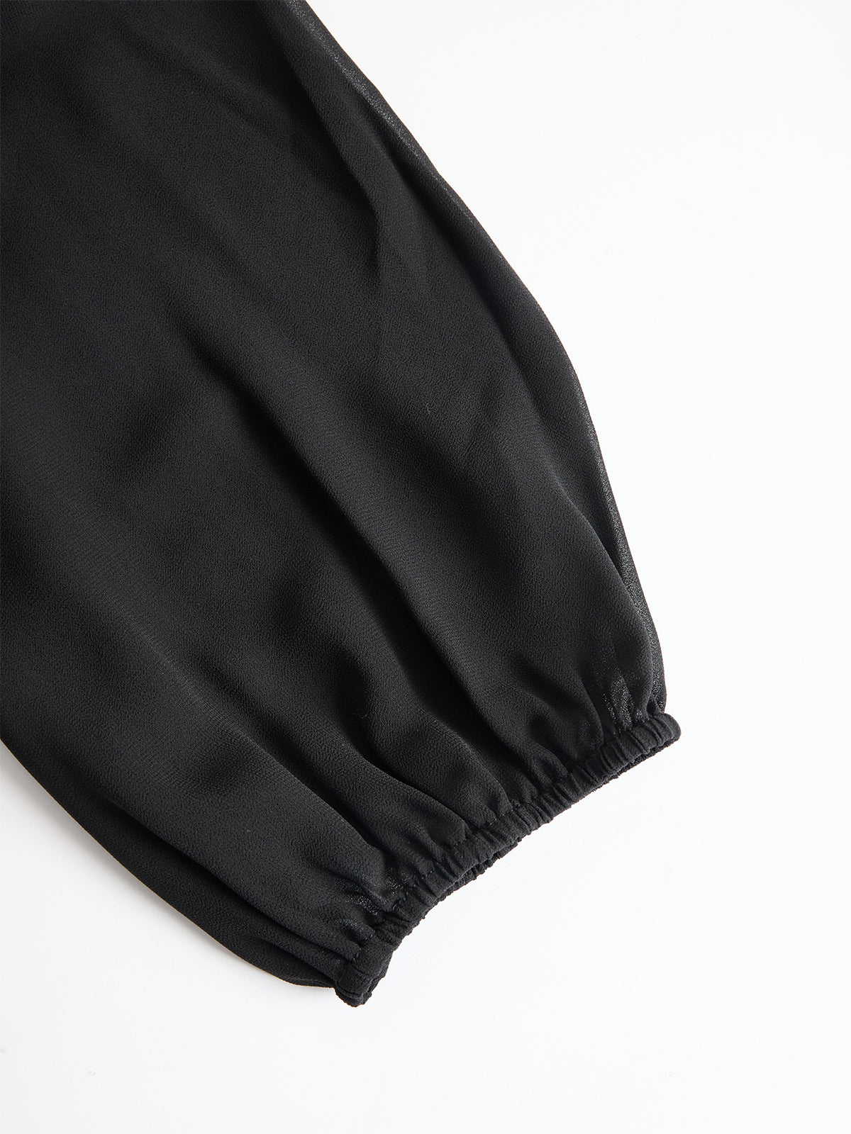 PARIS | Conjunto Negro Elegante con Mangas Abullonadas y Diseño de Pierna Ancha.